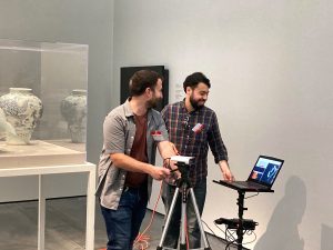 From left: Eric Leonardis and Talmo Pereira capturing the geometry of the room to create a digital model of the exhibition. 