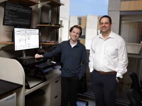Brendan Miller (left) and Alan Saghatelian (right) created the first microprotein atlas of the human frontal cortex with and without Alzheimer’s disease, then used the atlas to find a link between a microprotein and brain immune cell dysfunction in Alzheimer’s disease. The atlas was created with help from their AI-powered microprotein-finding tool, ShortStop, which can be seen on the computer.